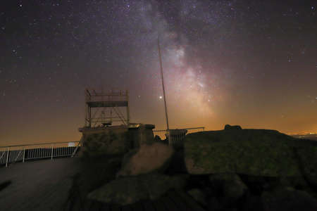 SZKLARSKA POREBA, POLAND - AUGUST 11, 2020: The Milky Way seen from the observation deck on Szrenica (1362 m above sea level), Szklarska Poreba, Poland, Europe.のeditorial素材