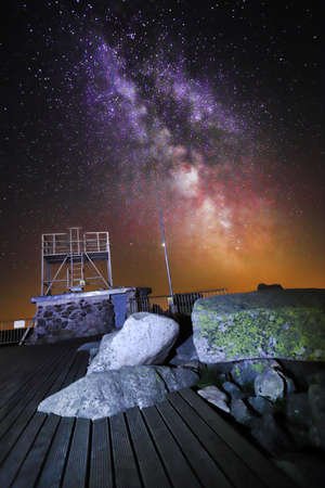 SZKLARSKA POREBA, POLAND - AUGUST 11, 2020: The Milky Way seen from the observation deck on Szrenica (1362 m above sea level), Szklarska Poreba, Poland, Europe.のeditorial素材