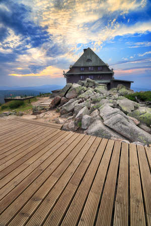 SZKLARSKA POREBA, POLAND - AUGUST 10, 2020: Szrenica mountain shelter (1362 m above sea level) during sunset, Szklarska Poreba, Poland, Europe.のeditorial素材