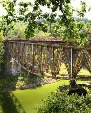 PILCHOWICE, POLAND - AUGUST 12, 2020: Railway bridge over Pilchowice Lake, which was supposed to be blown up for the filming of "Mission Impossible 7", Pilchowice, Poland, Europe.のeditorial素材