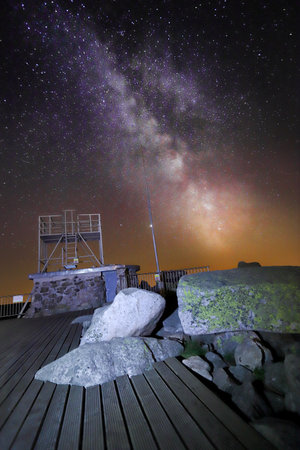 SZKLARSKA POREBA, POLAND - AUGUST 11, 2020: The Milky Way seen from the observation deck on Szrenica (1362 m above sea level), Szklarska Poreba, Poland, Europe.のeditorial素材