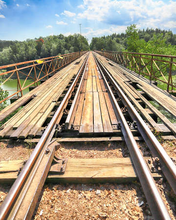 PILCHOWICE, POLAND - AUGUST 12, 2020: Railway bridge over Pilchowice Lake, which was supposed to be blown up for the filming of "Mission Impossible 7", Pilchowice, Poland, Europe.のeditorial素材