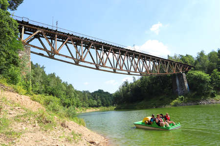 PILCHOWICE, POLAND - AUGUST 12, 2020: Railway bridge over Pilchowice Lake, which was supposed to be blown up for the filming of "Mission Impossible 7", Pilchowice, Poland, Europe.のeditorial素材