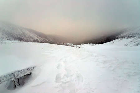Tourist trail to Sniezka (mountain on the border between the Czech Republic and Poland). Winter landscape. Giant Mountains, Poland, Europe.の写真素材