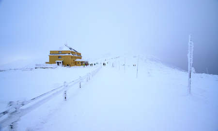 KARPACZ, POLAND - JANUARY 06, 2021: Tourist trail to Sniezka (mountain on the border between the Czech Republic and Poland). Winter landscape. Giant Mountains, Poland, Europe.のeditorial素材