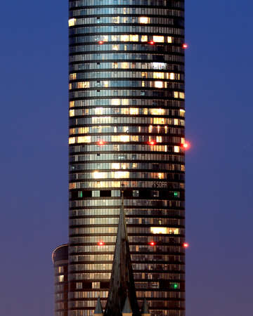 WROCLAW, POLAND - APRIL 04, 2021: Sky Tower, the tallest residential building in Poland (212m), just after sunset. A unique architectural project in Wroclaw, Poland, Europe.のeditorial素材