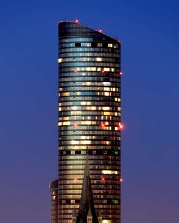WROCLAW, POLAND - APRIL 04, 2021: Sky Tower, the tallest residential building in Poland (212m), just after sunset. A unique architectural project in Wroclaw, Poland, Europe.のeditorial素材