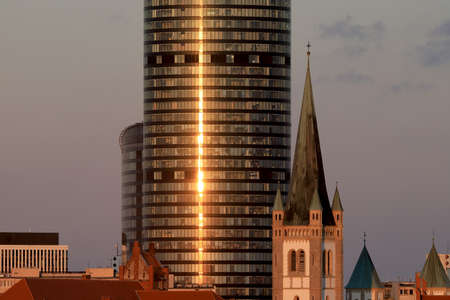 WROCLAW, POLAND - APRIL 04, 2021: Sky Tower, the tallest residential building in Poland (212m), during sunset. A unique architectural project in Wroclaw, Poland, Europe.のeditorial素材