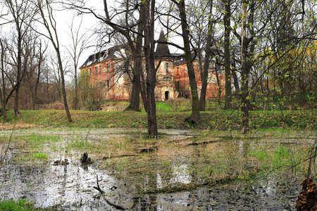WROCLAW, POLAND - APRIL 11, 2021: Palace in Komorowice near Wroclaw, Poland. Beautiful palace park at the beginning of spring.のeditorial素材
