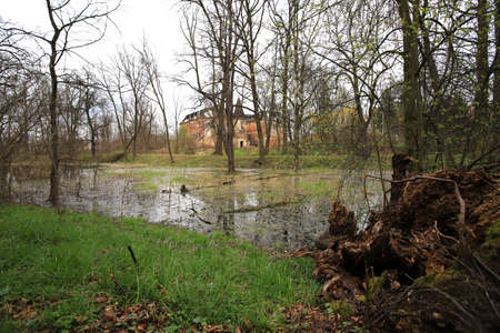 WROCLAW, POLAND - APRIL 11, 2021: Palace in Komorowice near Wroclaw, Poland. Beautiful palace park at the beginning of spring.のeditorial素材