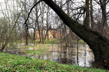 WROCLAW, POLAND - APRIL 11, 2021: Palace in Komorowice near Wroclaw, Poland. Beautiful palace park at the beginning of spring.のeditorial素材
