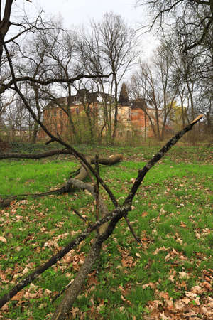 WROCLAW, POLAND - APRIL 11, 2021: Palace in Komorowice near Wroclaw, Poland. Beautiful palace park at the beginning of spring.のeditorial素材