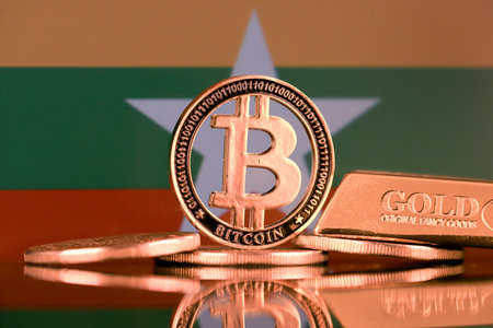 Physical version of Bitcoin, gold bar and Burma Flag.の写真素材