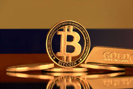Physical version of Bitcoin, gold bar and Colombia Flag.の写真素材