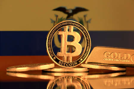 Physical version of Bitcoin, gold bar and Ecuador Flag.の写真素材