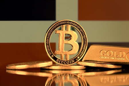 Physical version of Bitcoin, gold bar and Dominican Republic Flag.の写真素材