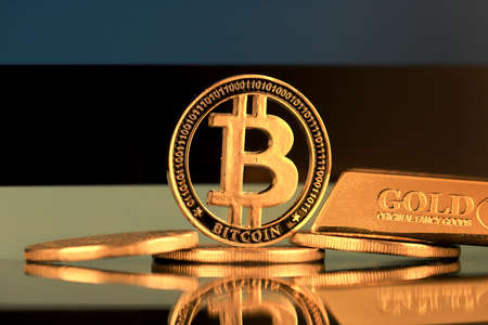 Physical version of Bitcoin, gold bar and Estonia Flag.の写真素材