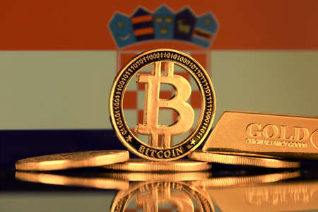 Physical version of Bitcoin, gold bar and Croatia Flag.の写真素材