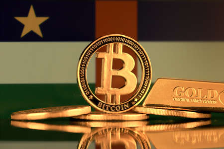 Physical version of Bitcoin, gold bar and Central African Republic Flag.の写真素材