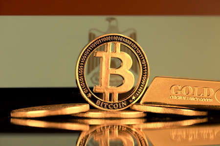 Physical version of Bitcoin, gold bar and Egypt Flag.の写真素材