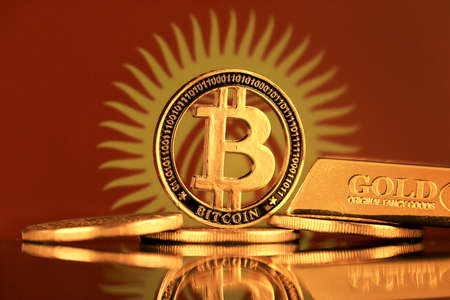 Physical version of Bitcoin, gold bar and Kyrgyzstan Flag.の写真素材