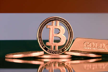 Physical version of Bitcoin, gold bar and Hungary Flag.の写真素材
