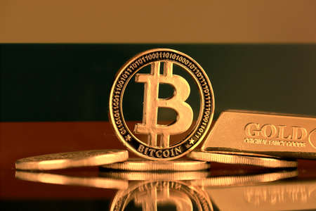 Physical version of Bitcoin, gold bar and Lithuania Flag.の写真素材