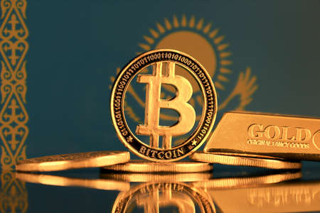Physical version of Bitcoin, gold bar and Kazakhstan Flag.の写真素材