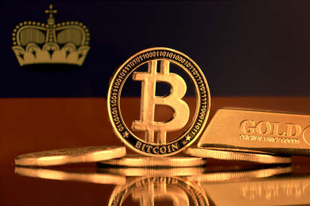 Physical version of Bitcoin, gold bar and Lichtenstein Flag.の写真素材