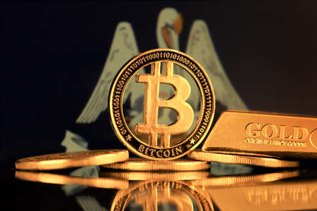 Physical version of Bitcoin, gold bar and Louisiana State Flag.の写真素材