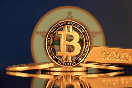 Physical version of Bitcoin, gold bar and Minnesota State Flag.の写真素材