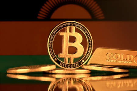Physical version of Bitcoin, gold bar and Malawi Flag.の写真素材