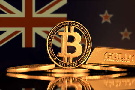 Physical version of Bitcoin, gold bar and New Zealand Flag.の写真素材