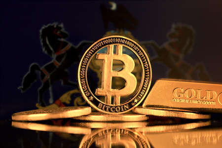Physical version of Bitcoin, gold bar and Pennsylvania State Flag.の写真素材
