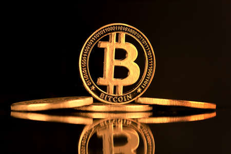 Physical version of Bitcoin. A conceptual image for investors in the fast-growing cryptocurrency and blockchain technology market.の写真素材
