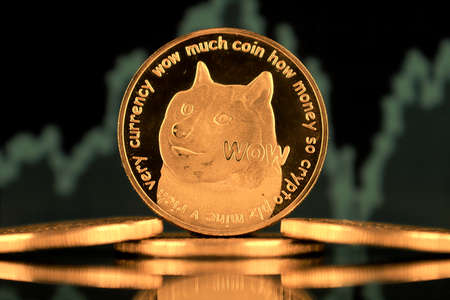 A physical version of Dogecoin (Cryptocurrency). A conceptual image for investors in the fast-growing cryptocurrency and blockchain technology market.の写真素材