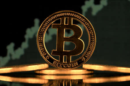 Physical version of Bitcoin. A conceptual image for investors in the fast-growing cryptocurrency and blockchain technology market.の写真素材