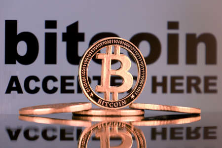 Physical version of Bitcoin. A conceptual image for investors in the fast-growing cryptocurrency and blockchain technology market.の写真素材