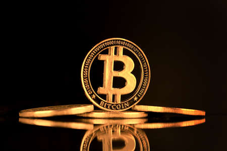 Physical version of Bitcoin. A conceptual image for investors in the fast-growing cryptocurrency and blockchain technology market.の写真素材