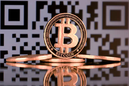 Physical version of Bitcoin. A conceptual image for investors in the fast-growing cryptocurrency and blockchain technology market.の写真素材