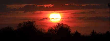 Beautiful sunset and clouds on the last day of april near Wroclaw, Poland, Europe.の写真素材