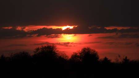 Beautiful sunset and clouds on the last day of april near Wroclaw, Poland, Europe.の写真素材