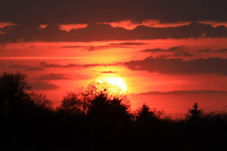 Beautiful sunset and clouds on the last day of april near Wroclaw, Poland, Europe.の写真素材
