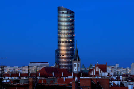 WROCLAW, POLAND - APRIL 04, 2021: Sky Tower, the tallest residential building in Poland (212m), just after sunset. A unique architectural project in Wroclaw, Poland, Europe.のeditorial素材