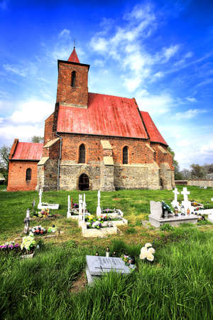 WROCLAW, POLAND - MAY 01, 2021: Roman Catholic Church of the Assumption of the Blessed Virgin Mary (15th century) in Wilczkow near Wroclaw, Poland, Europe.の写真素材