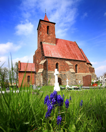 WROCLAW, POLAND - MAY 01, 2021: Roman Catholic Church of the Assumption of the Blessed Virgin Mary (15th century) in Wilczkow near Wroclaw, Poland, Europe.の写真素材