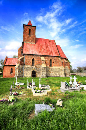 WROCLAW, POLAND - MAY 01, 2021: Roman Catholic Church of the Assumption of the Blessed Virgin Mary (15th century) in Wilczkow near Wroclaw, Poland, Europe.の写真素材