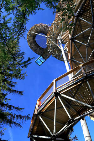 SWIERADOW-ZDROJ, POLAND - JUNE 05, 2021: Sky Walk in Swieradow-Zdroj, the highest observation tower in Poland (mesh and glass platform 62 meters above the ground).のeditorial素材