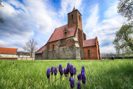 WROCLAW, POLAND - MAY 01, 2021: Roman Catholic Church of the Assumption of the Blessed Virgin Mary (15th century) in Wilczkow near Wroclaw, Poland, Europe.の写真素材