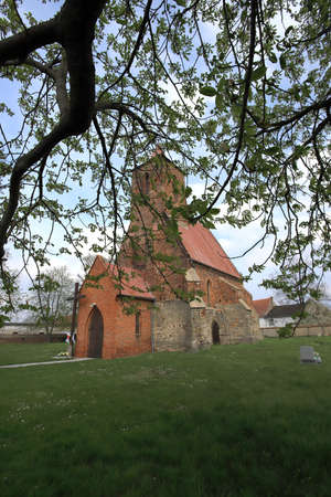 WROCLAW, POLAND - MAY 01, 2021: Roman Catholic Church of the Assumption of the Blessed Virgin Mary (15th century) in Wilczkow near Wroclaw, Poland, Europe.の写真素材